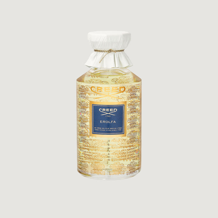 Creed Erolfa 490ml flacon - gold embossed glass, white leather cap, navy label | Creed Fragrances
