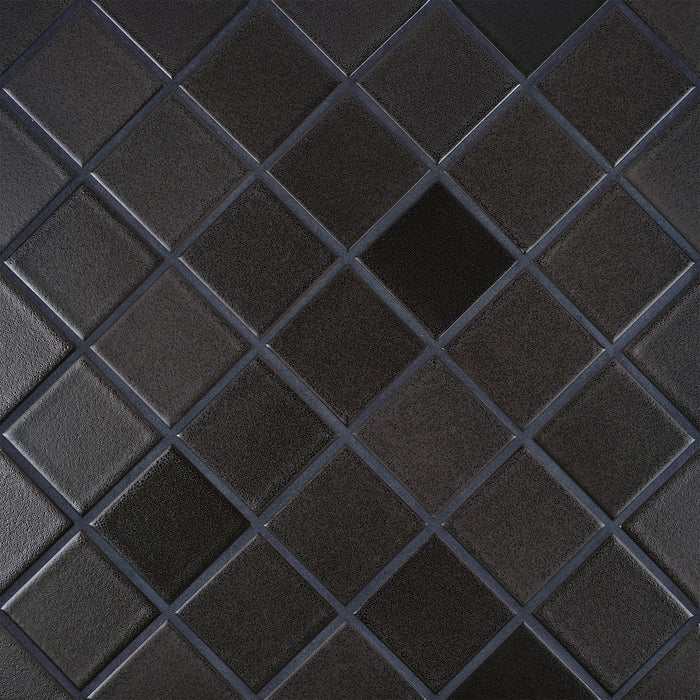 Caption: Classic Field 3x3 in LM5 Basalt-Gunmetal. Charcoal grout by Custom Building Products.