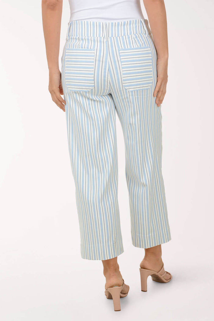 Light blue and white striped pants worn by a person on a white background