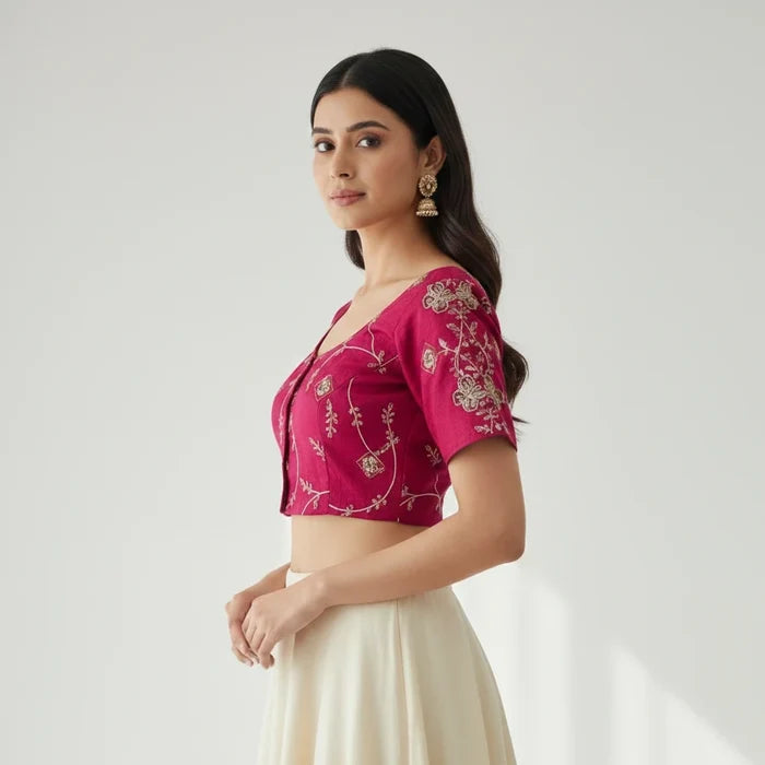 Kurti Connection USA hot pink ethnic blouse with gold floral embroidery, scoop neckline, and short sleeves.