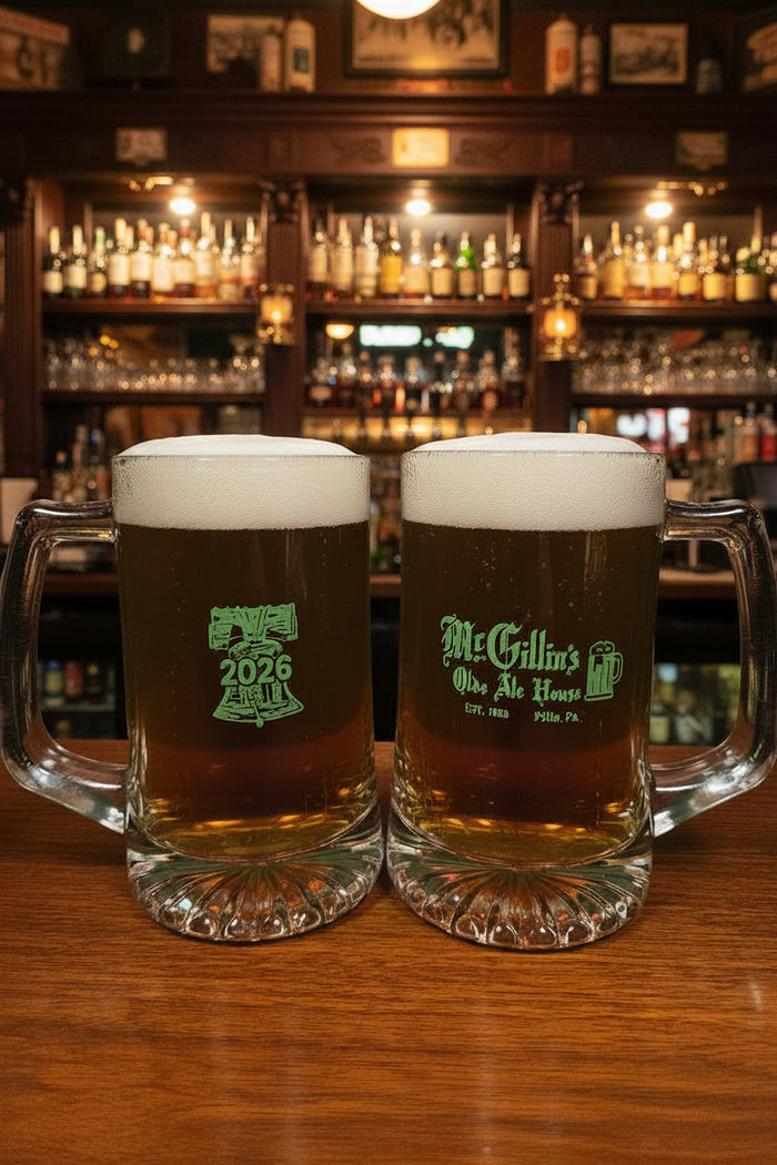 Two throwback glass mugs with 'McGillin's Ole Ale House'