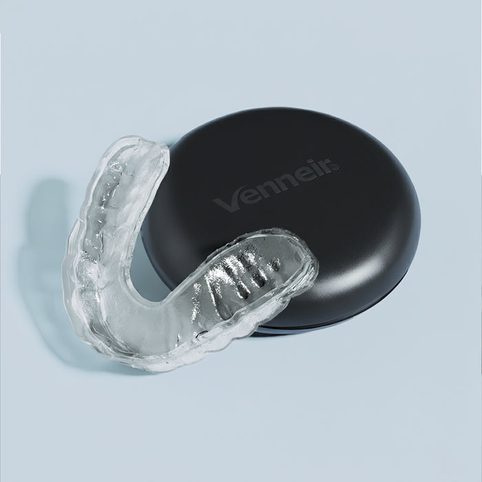 Custom night guard for upper teeth grinding with black protective storage case
