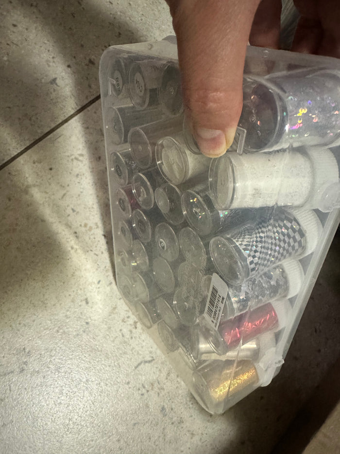 Holder full of new nail foils DEMO