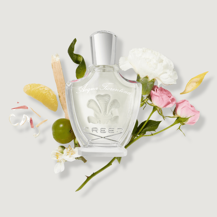 Acqua Fiorentina Fruity Floral Perfume with Rose and Citrus Notes - Ingredient Flat Lay | Creed Fragrances