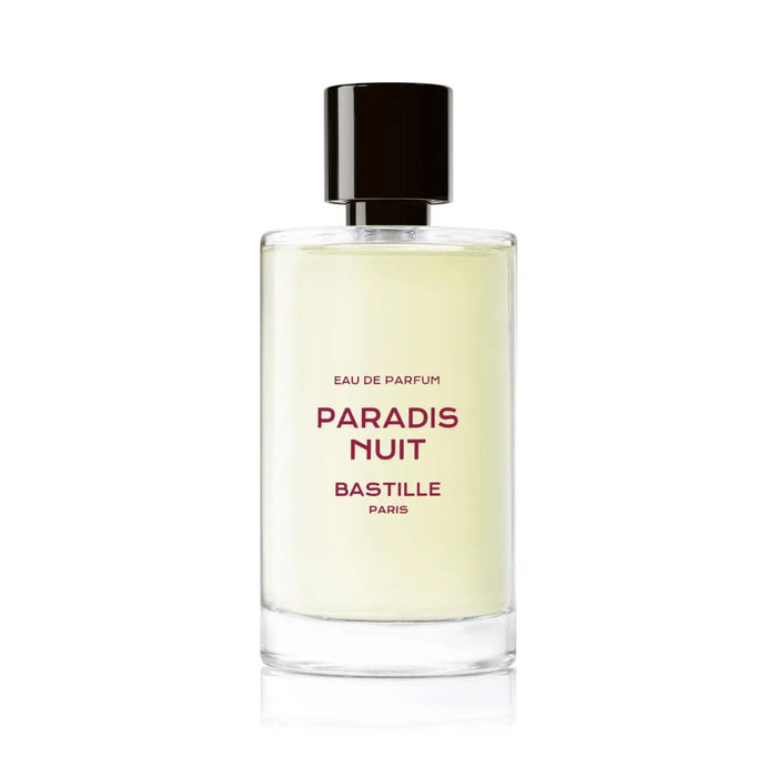 A bottle of 'Paradis Nuit' EDP by Bastille, with a purple box in the background. The bottle has a black cap and a label with white text on a purple background.