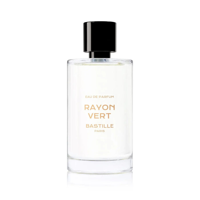 A yellow packaged perfume bottle labeled 'BASTILLE PARIS RAYON VERD' with a clear glass bottle showing the liquid inside. The box is in the background.