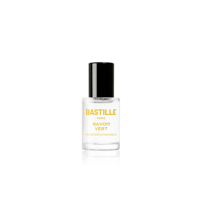 A yellow packaged perfume bottle labeled 'BASTILLE PARIS RAYON VERD' with a clear glass bottle showing the liquid inside. The box is in the background.