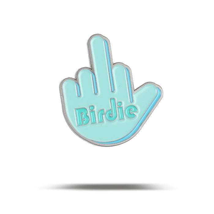The Birdie Finger - Ball Marker is a light blue, hand-shaped pin with a raised middle finger, silver outline, iron nickel plating, and “Birdie” written across the palm. It’s shown on a white background with a faint shadow below.