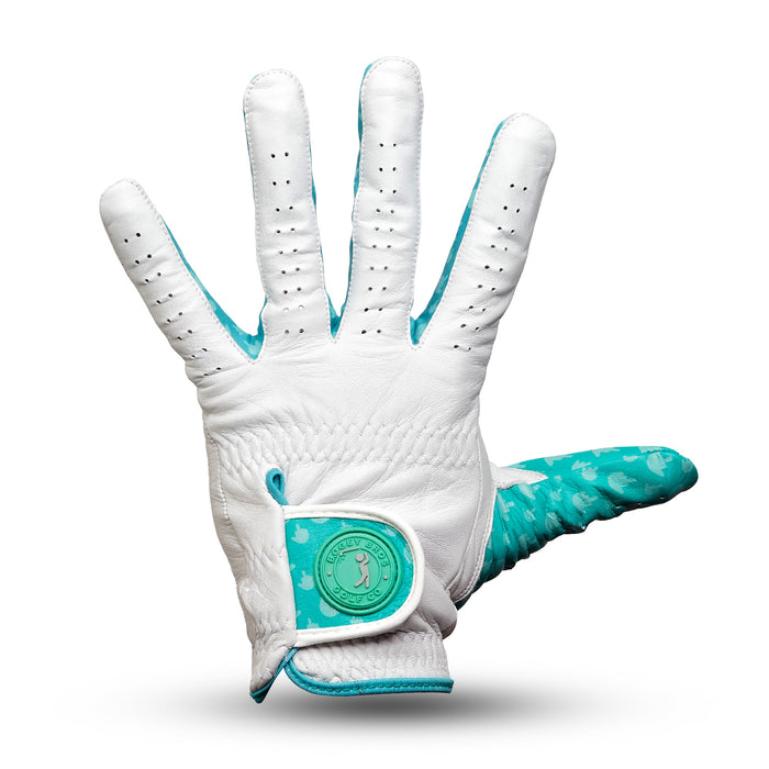 The Birdie Finger - Glove is a white cabretta leather golf glove with teal accents, palm up view. It features precision fit, ventilating perforations, reinforced seams, teal trim, and a round teal logo patch on the wrist closure.