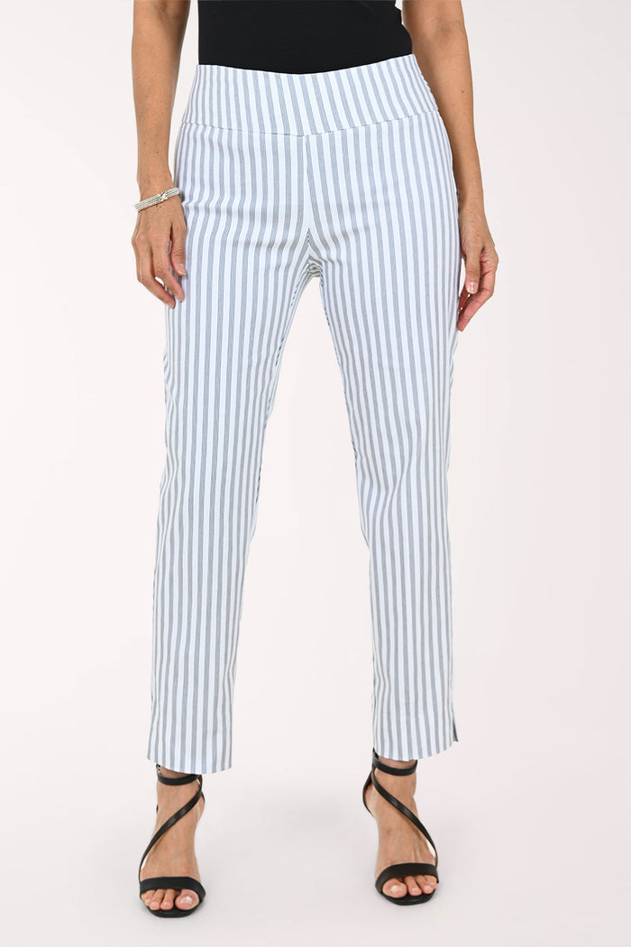 A model wearing light blue and white vertically striped cropped trousers, paired with a black top and black strappy high-heeled sandals, against a plain white studio background.