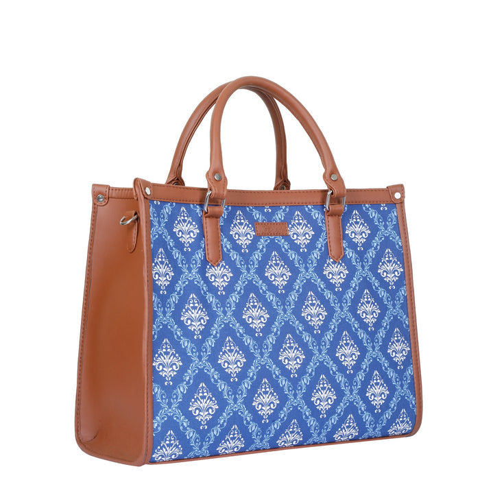 Handcrafted blue printed canvas top‑handle laptop tote bag with padded laptop compartment and shoulder strap for travel, work and everyday use-half side view