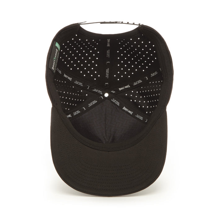 The Bogeyman Black Performance Golf Hat is a black snapback cap with inner ventilation holes, black fabric bands with white text, a curved brim, and sweat stain resistant material, shown from above to reveal the inside.