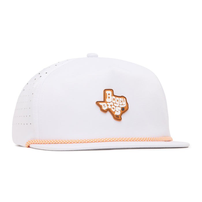 A white snapback cap with orange trim, featuring a Texas-shaped patch on the front that says Boggy Bros in bold orange and white letters. The sides have small ventilation holes for breathability.