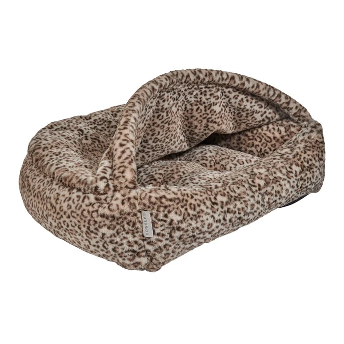 Leopard print pet bed on a white background