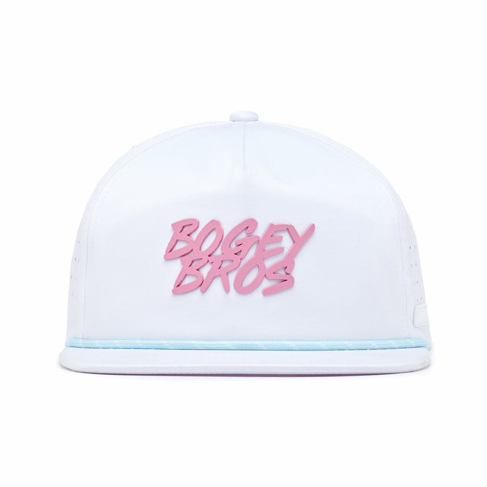 The Da 90's Unstructured Flat Bill Snapback is a white performance hat with "BOGEY BROS" in bold pink text, a light blue brim accent, side ventilation holes, and an adjustable snapback for all-day comfort.