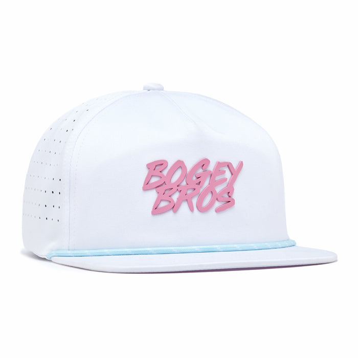 The Da 90's Unstructured Flat Bill Snapback Hat is white, made from performance material with side ventilation holes. It has bold pink "BOGEY BROS" text on the front and a light blue accent strip above the flat brim, shown on a plain background.