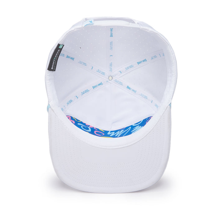Inside view of the “Da 90's - Unstructured Flat Bill Hat - Snapback” reveals stitched panels, a BOCO Gear label, white sweatband, and a blue flat brim with colorful abstract patterns—displayed on a white background.