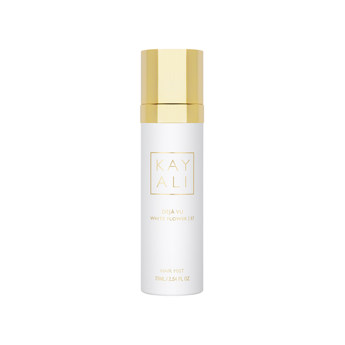 White bottle with gold cap on a white background