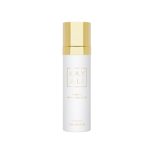 White bottle with gold cap on a white background