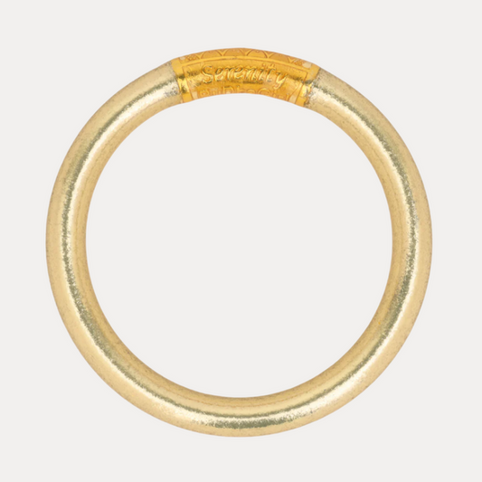 a gold ring with a gold band