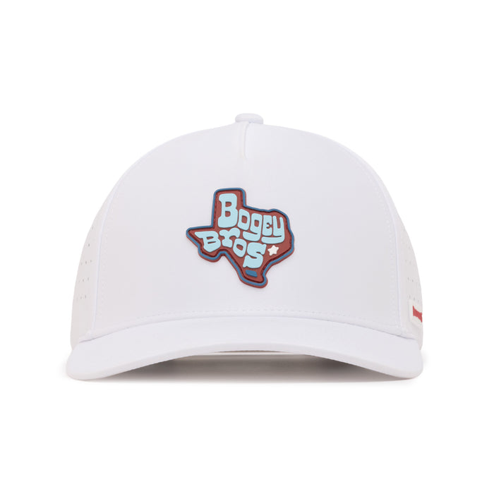 A white baseball cap with a patch of the Texas state outline on the front. Inside the outline, the words “Bogey Bros” are written in blue and white letters. The cap has small ventilation holes on the sides.