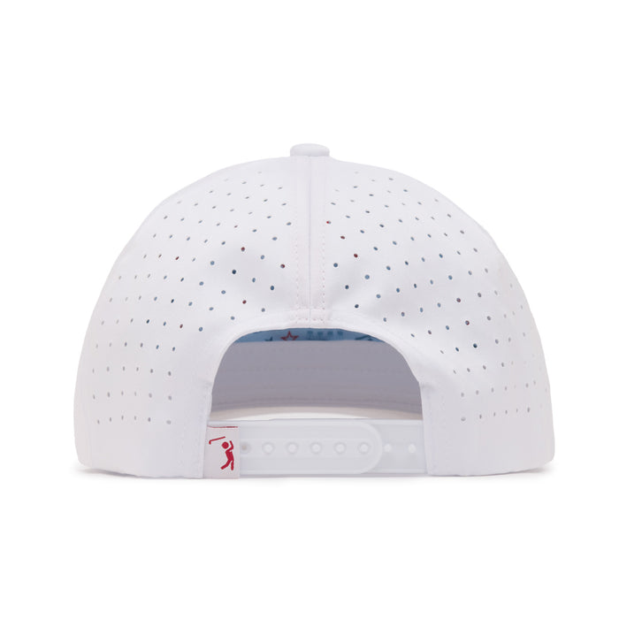 A white baseball cap viewed from the back, featuring small evenly spaced ventilation holes. The adjustable snap closure is visible, along with a small red logo tag on the left side of the closure. The interior lining is partially visible.
