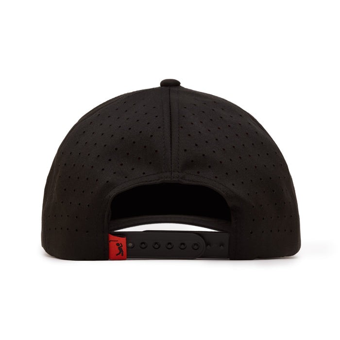 A black baseball cap viewed from the back, featuring small ventilation holes, a black adjustable snapback strap, and a red tag with a small black logo on the left side of the strap.