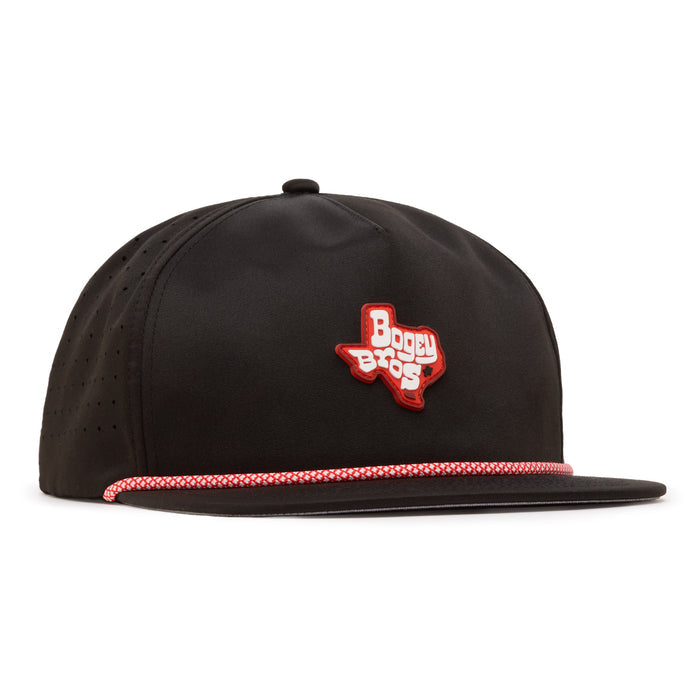A black flat-bill hat with a red and white rope above the brim. On the front is a red Texas-shaped patch reading Bogey Bros in white text. The hat has small ventilation holes on the side panels.
