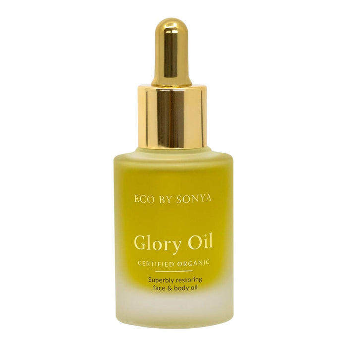 Bottle of Eco by Sonya Glory Oil with gold cap on a white background.