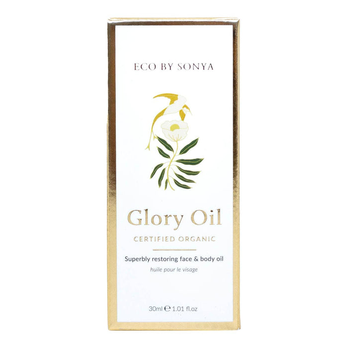 Eco by Sonya Glory Oil packaging with gold frame and floral design on a white background.