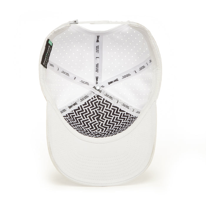 The I Heart Cart Girls - Performance Golf Rope Hat - Snapback is a white cap with a black-and-white zigzag inner front panel, breathable white mesh, and a stain-resistant white sweatband tape featuring black branding and text.