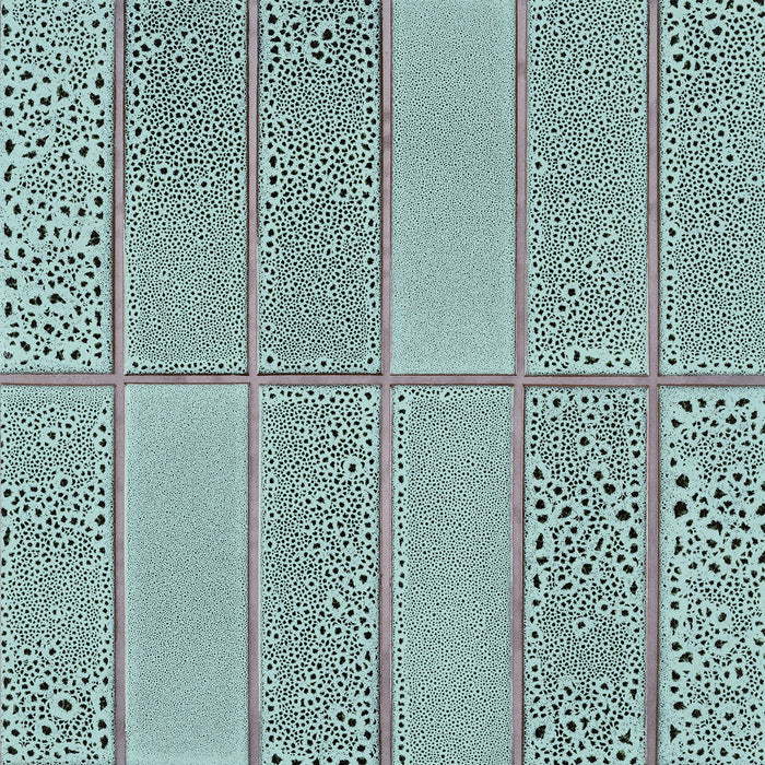 Caption: Classic Field 3x9 in LG7 Opaque White-Antique Green. Natural Grey grout by Custom Building Products.