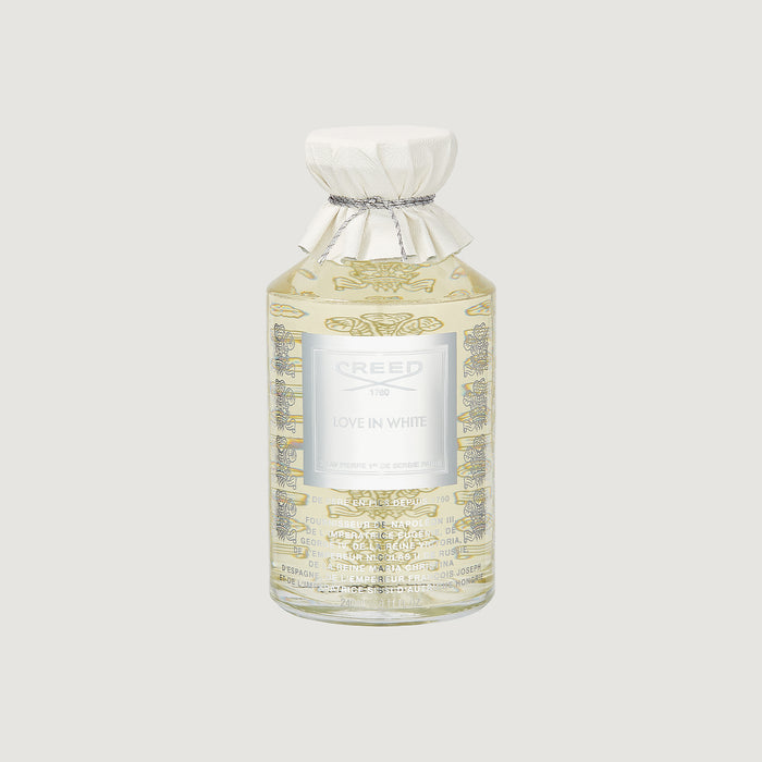 Creed Love In White 240ml flacon with gold floral motif and white leather cap - Front View | Creed Fragrances