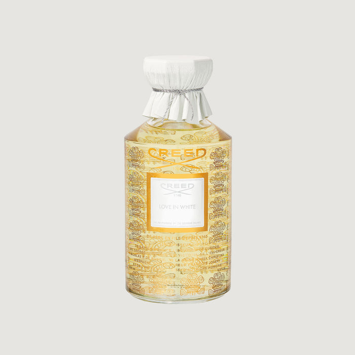 Creed Love In White 490ml gold floral flacon with white leather cap - Front View | Creed Fragrances