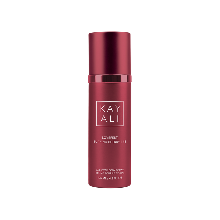 Red spray bottle with 'KAYALI' branding on a white background