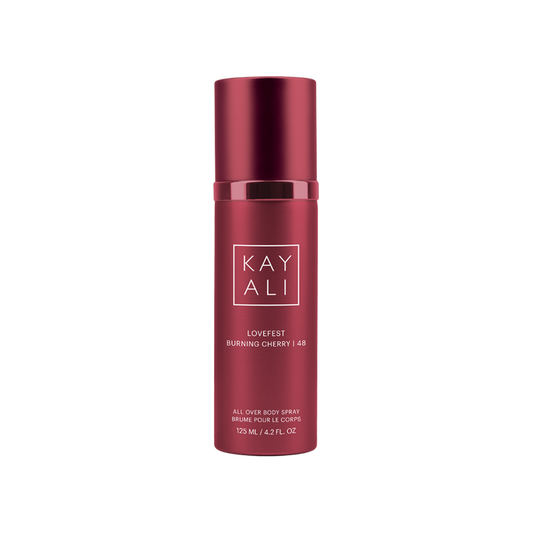 Red spray bottle with 'KAYALI' branding on a white background