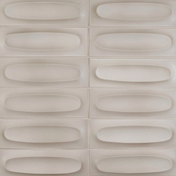 Caption: Dimensional Ovals in M142 White Pumice. Oyster Grey grout by Custom Building Products.