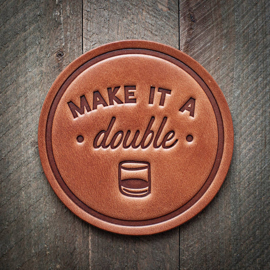 Leather coaster with Make it a double text.