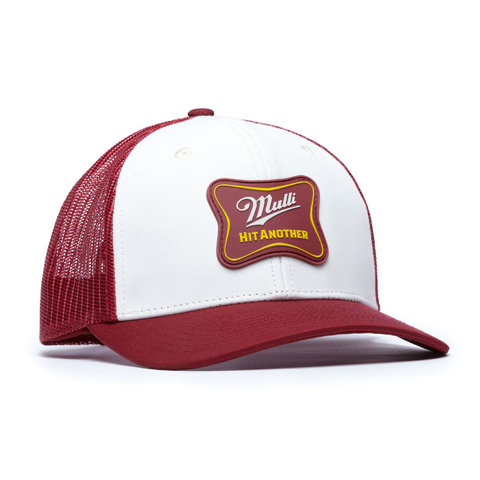 The Mulli Hit Another Mesh Trucker Hat is a snapback with a white front panel and top button, maroon bill and mesh back, plus a red/yellow patch reading "Mulli HIT ANOTHER" in stylized text.