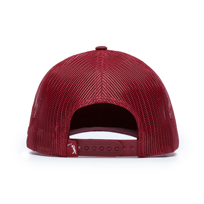 The Mulli Hit Another Mesh Trucker Hat is a maroon snapback cap with a mesh back for ventilation, an adjustable closure, and a small white golfer logo on the left strap. It features a rounded crown and a button on top.