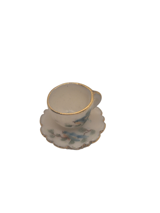 Nancy Duden – Porcelain Cup & Saucer with Handpainted Bird Design