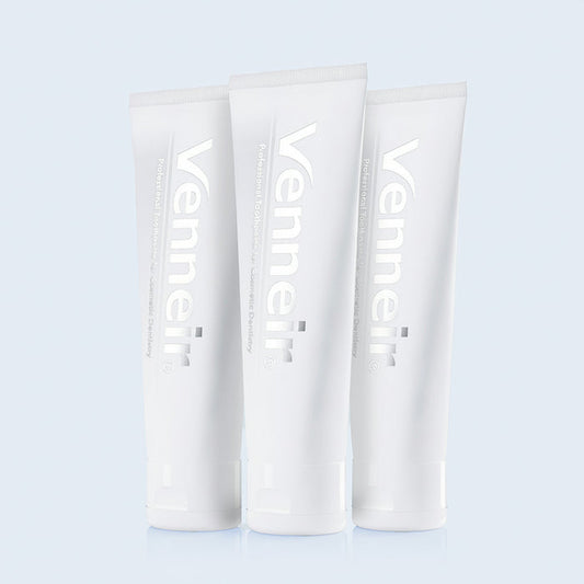 Three pack non-abrasive toothpaste for veneers composite bonding and stain removal on blue background