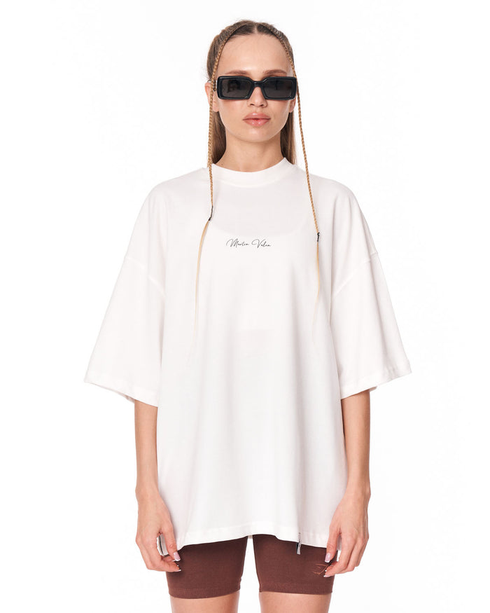 Oversized Monarch Loop White T-Shirt styled with brown biker shorts
