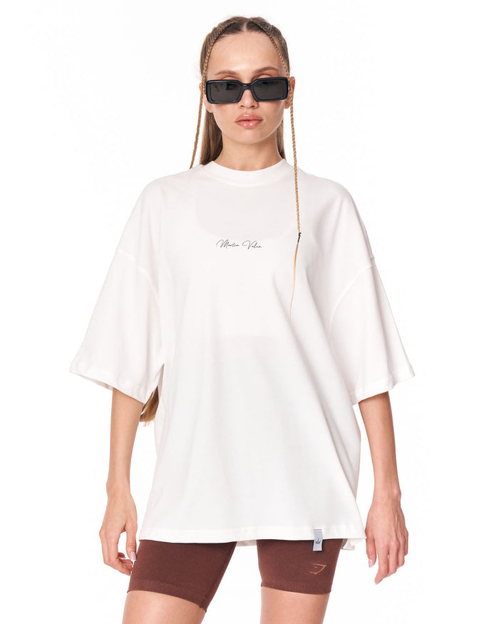 Oversized Monarch Loop White T-Shirt with moon phase butterfly artwork