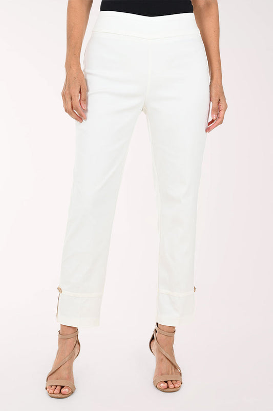 White cropped ankle pants with rolled cuffs and small side zippers, shown on a model wearing beige strappy heels against a plain light background.