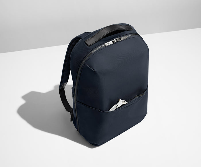 Exterior front pocket packed with a charging cord