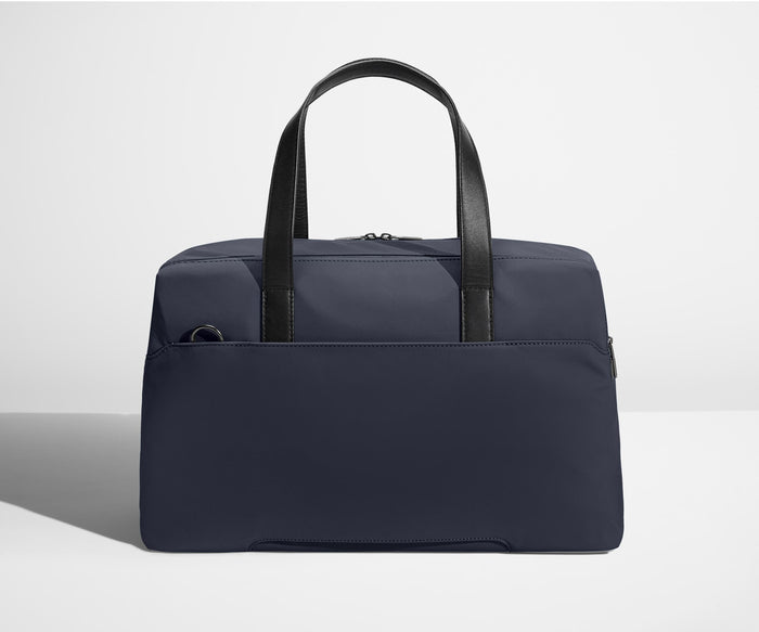 Back view of The Overnight bag with trolley sleeve pass-through