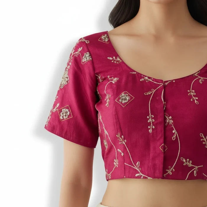 Kurti Connection USA hot pink ethnic blouse with intricate gold floral embroidery, scoop neckline, and short sleeves.