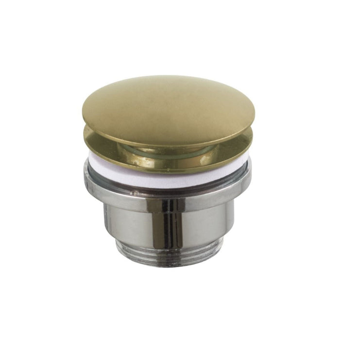 Brushed brass basin waste on a white backround