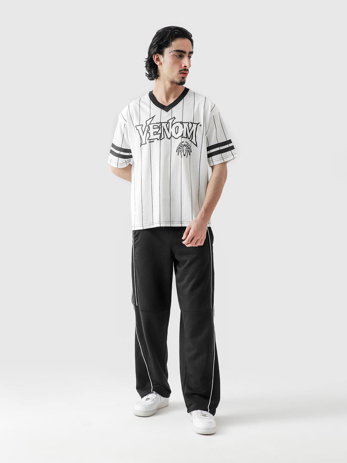 VENOM jersey white male model seated lifestyle shot Pakistan – GROOVY